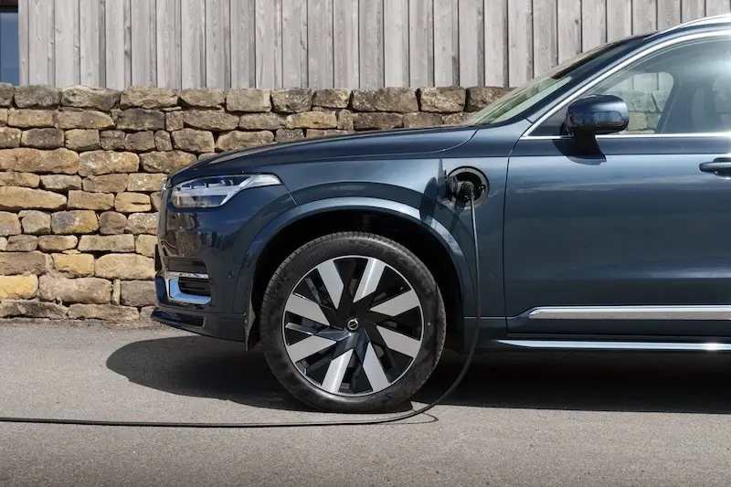 Volvo XC90 PHEV plugged in via cable
