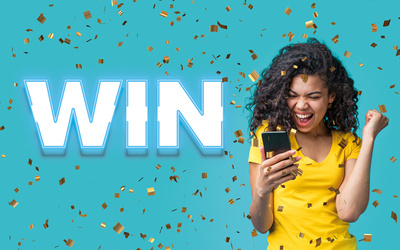 Excited woman in a yellow shirt celebrating and looking at her phone with gold confetti falling around her on a blue background, next to the large glowing word WIN, representing a contest or prize event related to used cars and new cars.