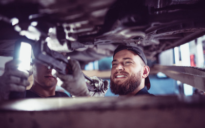 mechanics under car