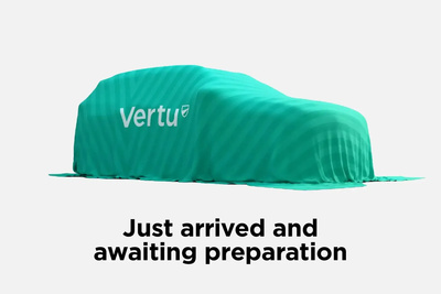 Car covered in teal sheet
