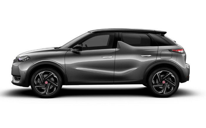 Side view of a sleek grey compact SUV with black roof and tinted windows, showcasing modern design and alloy wheels, ideal for advertising used cars and new cars.
