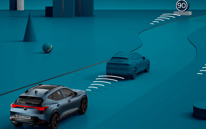 Digital illustration of two blue CUPRA cars driving on a stylised blue road with curved path lines and a speed limit sign showing 90. The front car is blurred to signify movement and safety radar lines indicate active driving assistance. The background includes geometric shapes like cones and spheres.