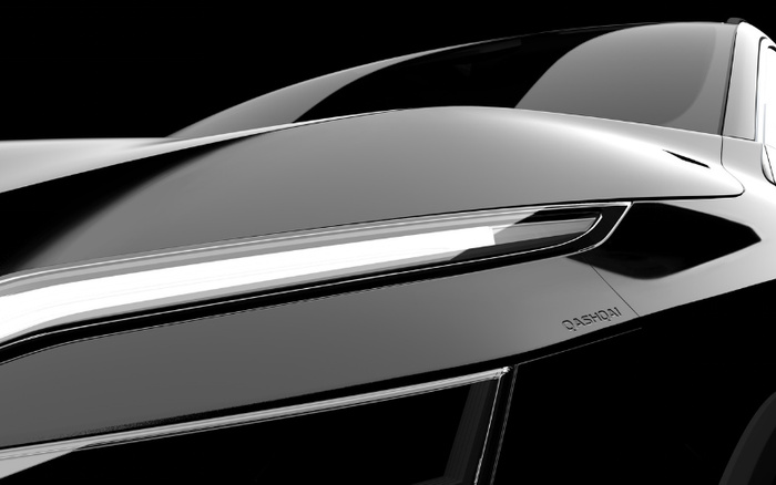 Close-up side view of a sleek, black new Nissan Qashqai car highlighting the modern LED headlight design and smooth body curves, representing stylish new cars and used cars options.