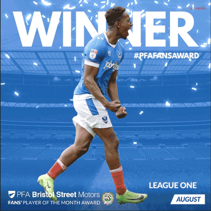 Football player in blue and white kit celebrating with clenched fists and shouting, with large text 'WINNER' and hashtag '#PFAFANS AWARD' above. The image announces the League One Fans' Player of the Month Award for August, sponsored by PFA Bristol Street Motors, which is a dealer known for used cars and new cars. The background shows a stadium with confetti falling.
