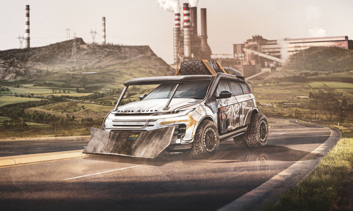 Modified Range Rover off-road vehicle driving on a curved road with large rugged tyres, graffiti on the side, and two spare tyres secured on the roof. The front has a large metal plough attachment. Background shows industrial buildings with smoking chimneys and hilly green landscape under a cloudy sky. Keywords used cars, new cars.