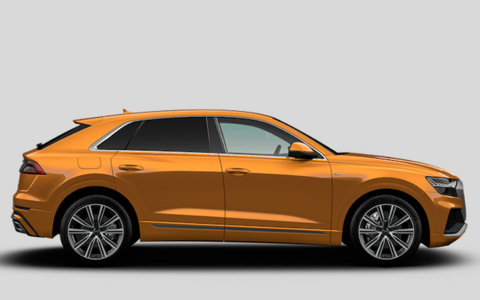 Side view of a sleek orange luxury SUV with tinted windows and sporty alloy wheels, showcasing a modern and aerodynamic design, suitable for used cars or new cars listings.