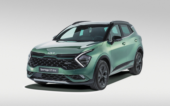 Green Kia Sportage GT-line SUV with black roof and wheels displayed on a plain white background, showcasing the front and side profile. Emphasising the vehicle's modern design and sporty features, ideal for promotions involving used cars and new cars.
