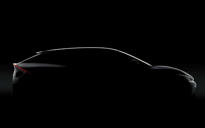 Silhouette of a sleek modern hatchback car on a dark background, emphasising its smooth aerodynamic lines and rear LED tail light, representing an innovative new car model ideal for promoting used cars and new cars in the automotive market.