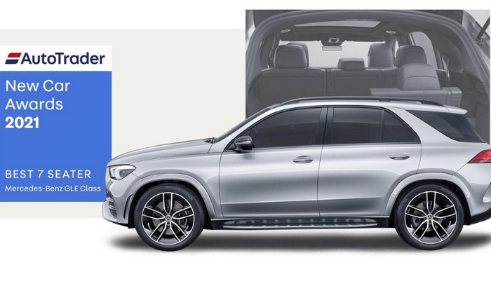 AutoTrader New Car Awards 2021 banner featuring the Best 7 Seater Mercedes-Benz GLE Class silver SUV viewed from the side with an open tailgate showing spacious interior, suitable for new cars and used cars search.