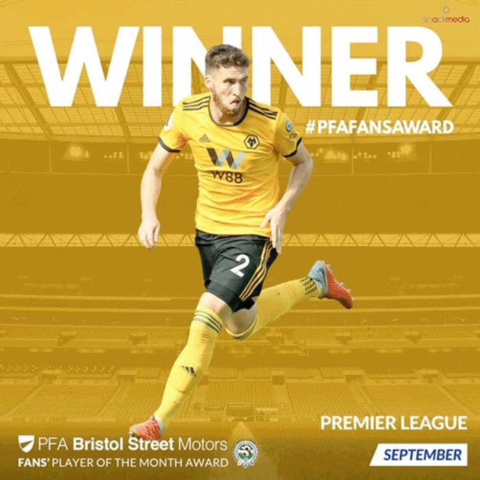 Football player in Wolverhampton Wanderers kit with number 2 running on pitch, text overlay reads WINNER #PFAFANSAWARD, PFA Bristol Street Motors Fans' Player of the Month Award, Premier League, September. The image promotes Bristol Street Motors, a dealership for used cars and new cars.