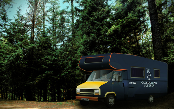 A Caledonian Sleeper camper van parked in a dense forest with tall evergreen trees in the background, featuring a distinctive navy blue and yellow colour scheme with registration plate LOW 3 SKF, suitable for travellers looking for used cars and new cars in recreational vehicles.