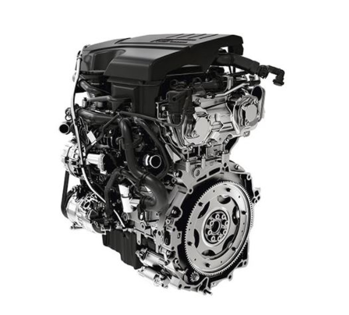 High-resolution detailed image of a modern car engine isolated on white background, showcasing metallic components including the flywheel, various hoses, and mechanical parts. Ideal for illustrating used cars and new cars engine quality and performance.