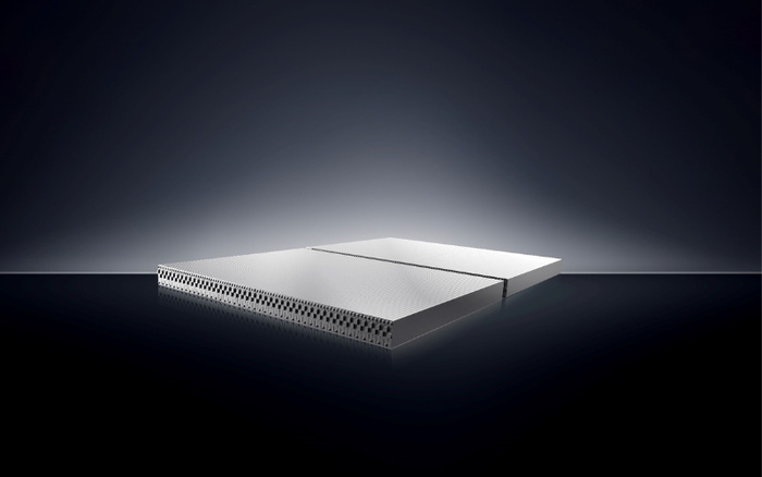 Close-up view of a cross-section of an electric vehicle battery pack structure with layered cells and cooling channels, representing advanced technology used in new cars and used cars with electric drivetrains.